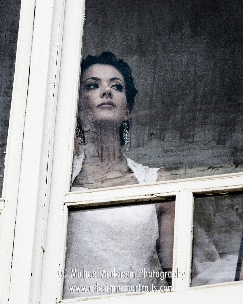 Destination wedding photography in Chicago, Ill. Bride watches as her guests arrive before the ceremony.
