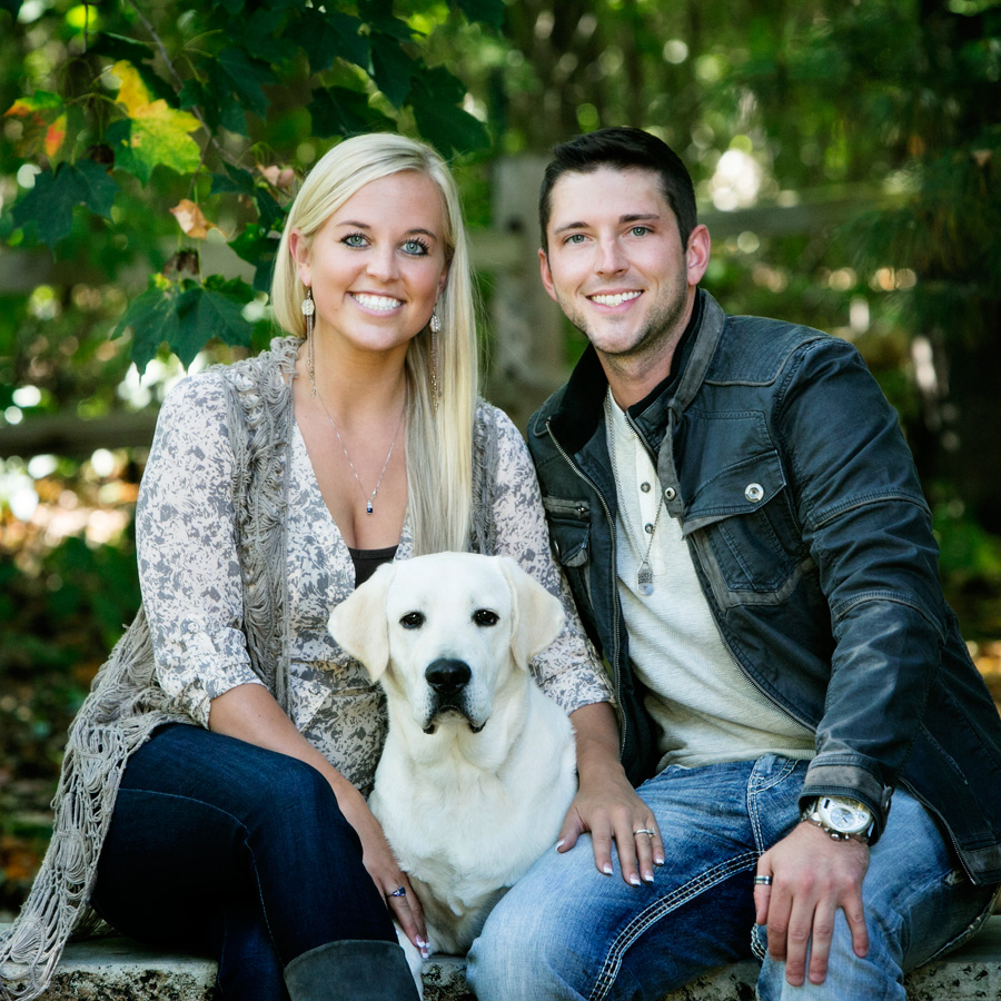Engagement Portrait Tips. Engagement portrait with a dog taken at Michael Anderson Photography's Portrait Park in Mounds View, MN.