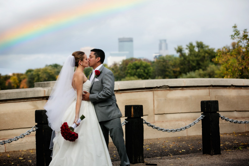 Bride and groom with their own rainbow at Lake of the Isles near downtown Minneapolis.