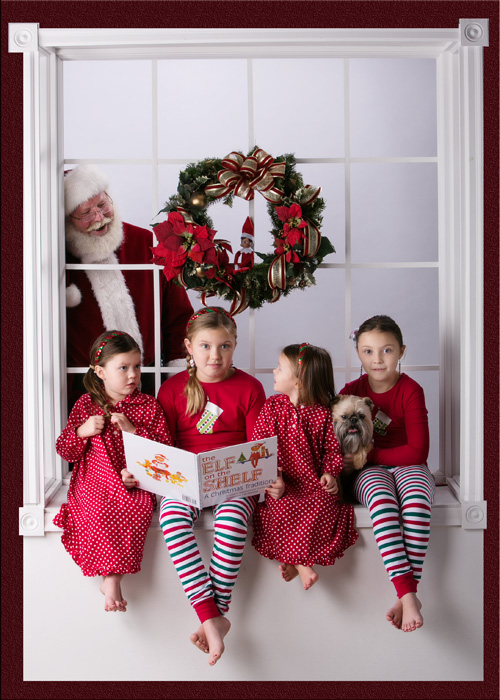 Santa made a surprise visit during Olyvia, Hazyll, Vyvian and Ingryd's Christmas portrait session last night.