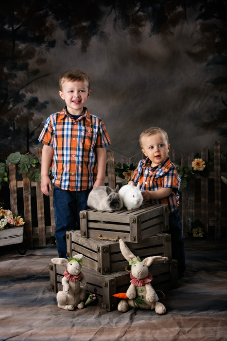 Easter portraits with live bunnies as two brothers play with "Hop" and "Carrot."