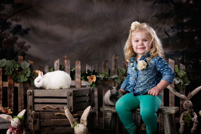 Two year old girl with "Hop" and "Carrot" for her 2014 Easter portraits with live bunnies.