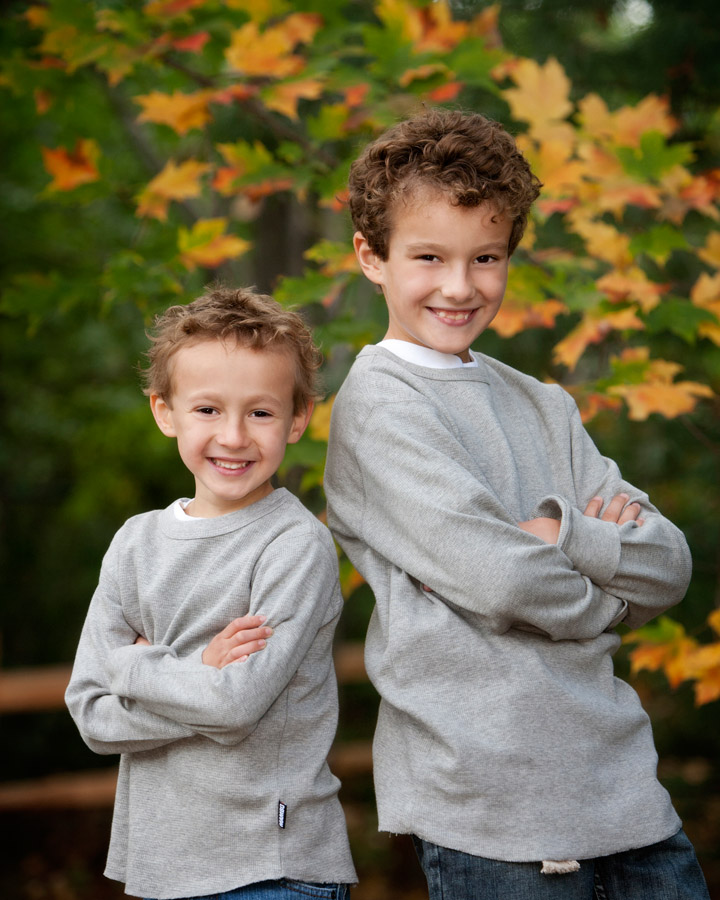 Kid's portrait of two brothers taken in Fall colors at Anderson's Portrait Park.