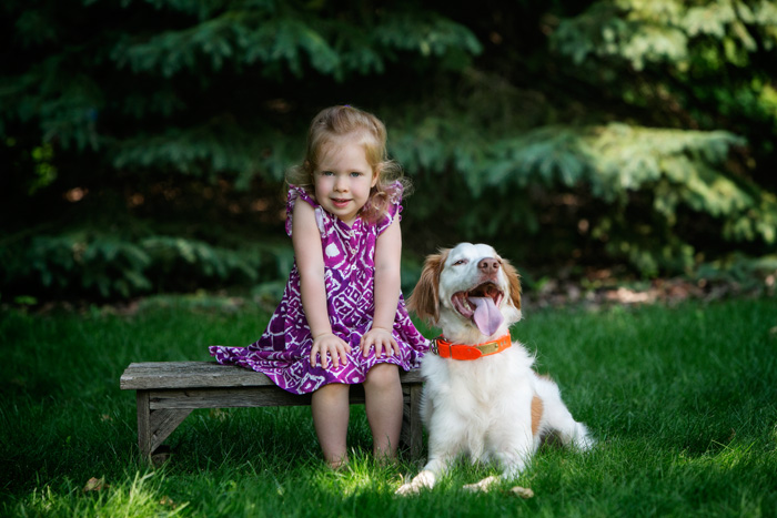 Three year old portraits of Katie and her dog Gunner taken at Anderson's Portrait Park in Mounds View, MN.