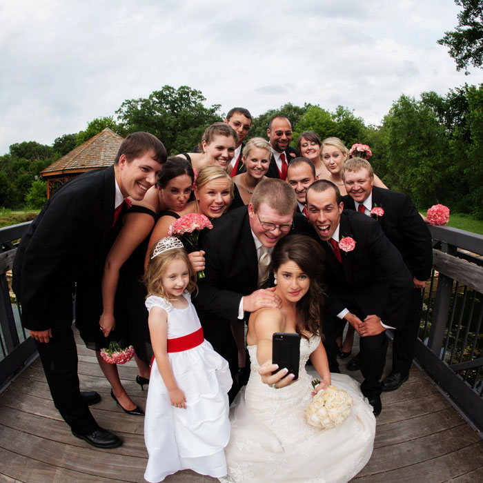 Bride, groom and their wedding party "selfie" at the Eagan Community Center. Image taken with a fisheye lens.