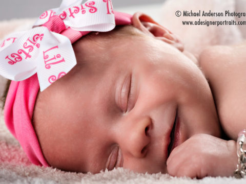 Baby girl newborn portraits of three week old Lainey taken at the home studio of Michael Anderson Photography in Mounds View, MN.