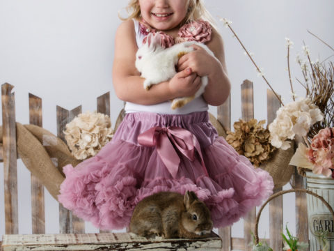 Averie and her 2015 Easter portraits with live bunnies.