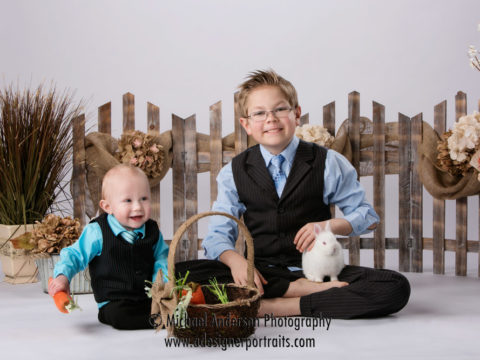 Cole and his brother Jack have their Easter bunny photos taken with live bunnies.