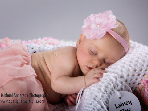 Three month old baby portraits of a sleeping Lainey Elise.