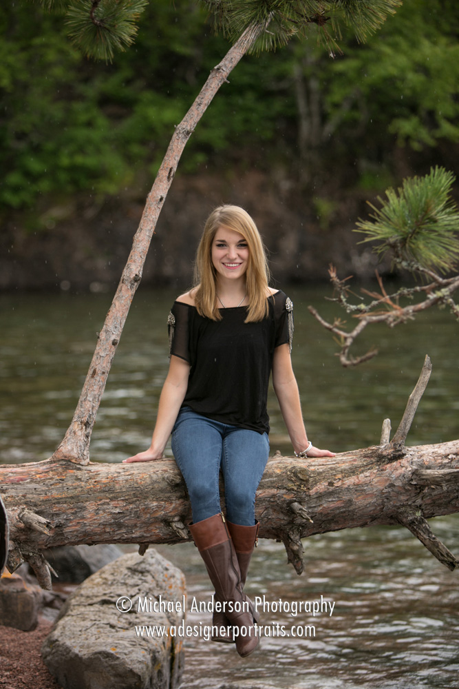 Lake Superior photography of an Irondale High School senior portrait created in a small bay on Lake Superior.
