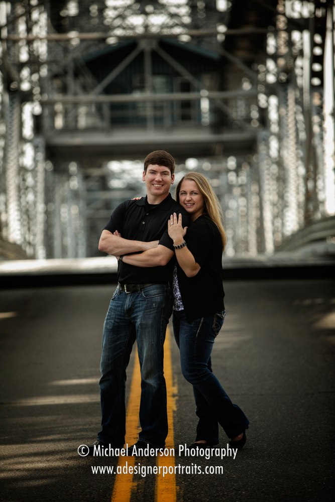 Lake Superior photography of an engagement portrait created by the famous Duluth Aerial Lift Bridge.