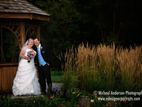 Eagan Community Center wedding photography of a bride & groom by the pretty gazebo at sunset.