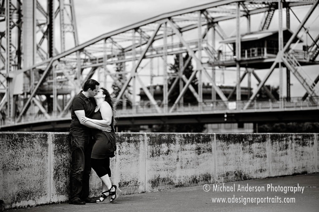 Engagement photos on Lake Superior with the famous Duluth aerial lift bridge in the background.