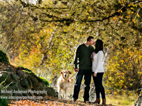Beautiful fall engagement portraits of a cute couple and their golden retriever at Panola Valley Gardens in Lindstrom, MN.