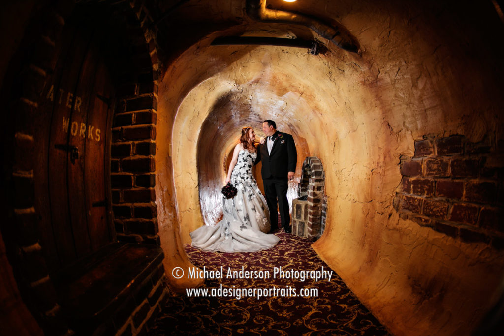 Chanhassen Dinner Theater wedding photograph of a bride & groom in the cave under the theater.
