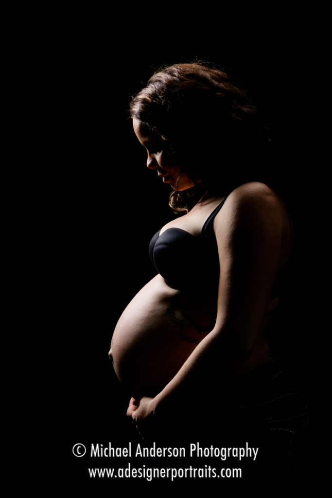 Mounds View photographer. Alyssa in silhouette during her studio maternity and newborn portraits.