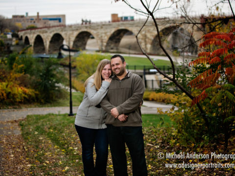 Minneapolis engagement portraits near the Stone Arch Bridge.