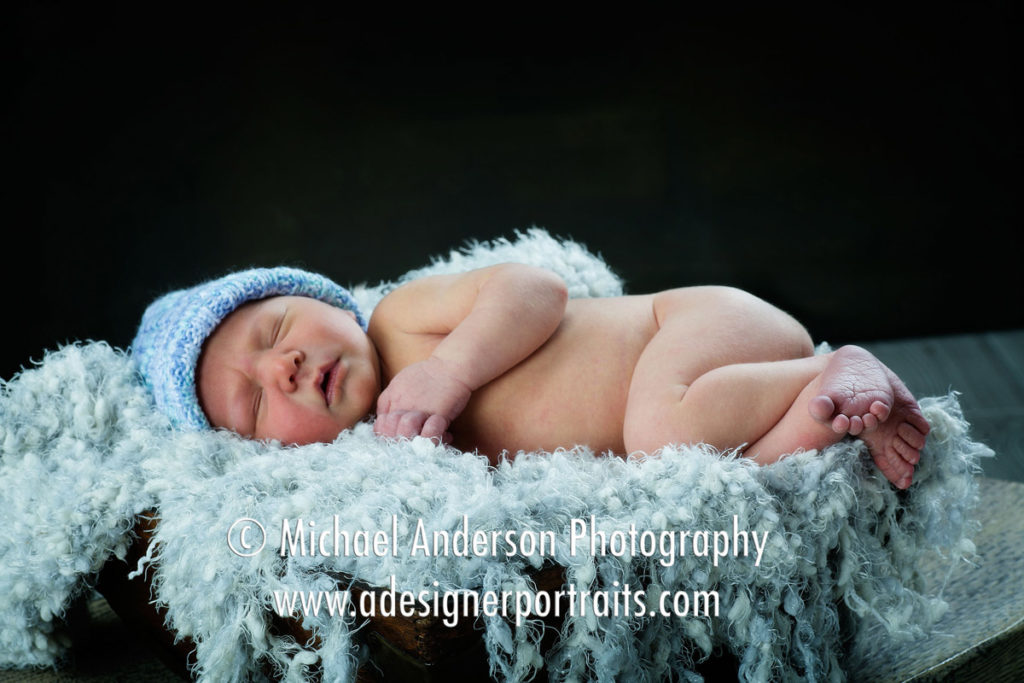 Mounds View Photographer. Beautiful newborn photography of a three day old baby boy named Logan.