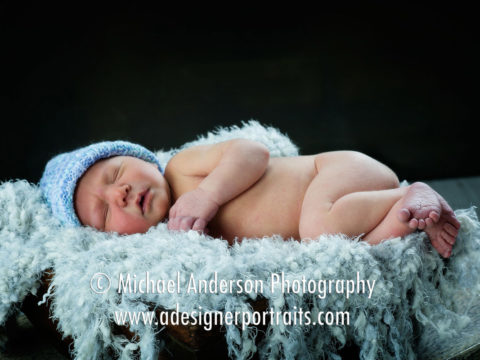 Beautiful newborn photography of a three day old baby boy named Logan.