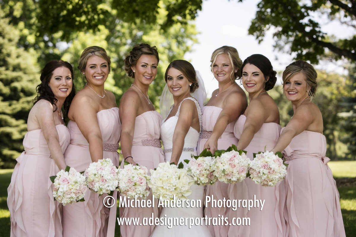 The bride & her bridesmaids at Brackett's Crossing Country Club in Lakeville, MN.