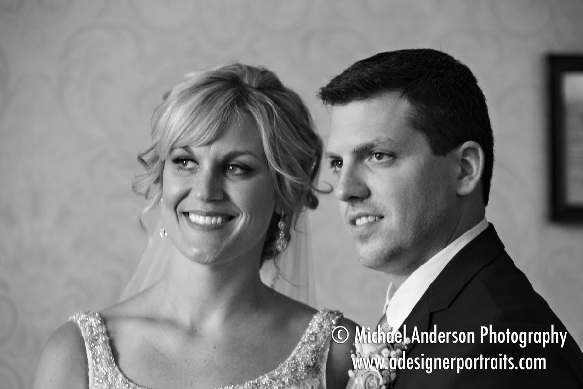 B&W Saint James Hotel wedding photo of a bride & groom in a parlor at the historic hotel.