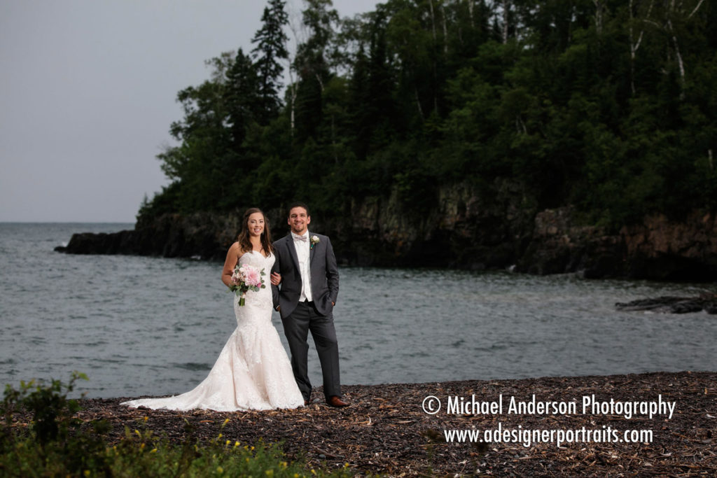 A classic full length bridal portrait of Steve & Kaitlin taken on the north shore of Lake Superior before their Superior Shores wedding.