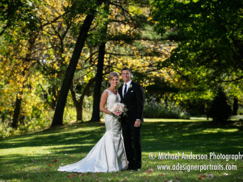 Beautiful backlit fall wedding photo of the bride & groom taken at Mississippi Gardens in Minneapolis, MN.