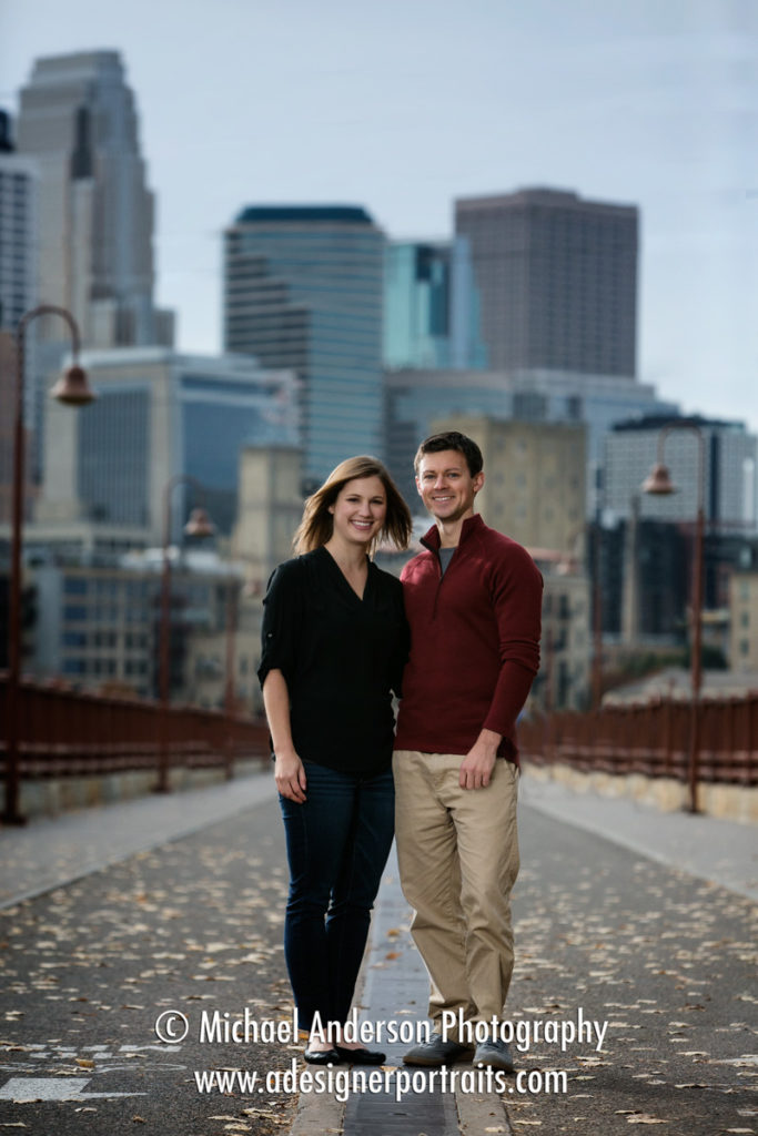 Fun engagement portraits by the Stone Arch Bridge in Minneapolis, MN.