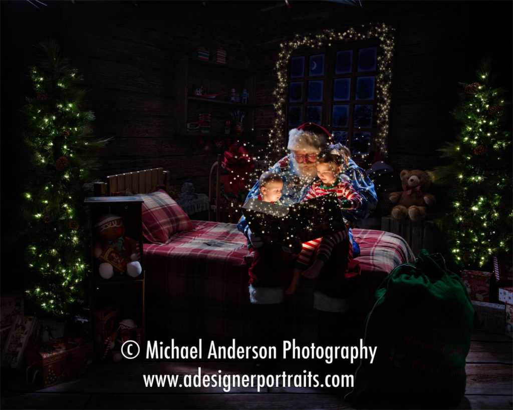Santa reading "The Night Before Christmas" to two adorable kids during their Heirloom Christmas Portraits with Santa Claus 2016.