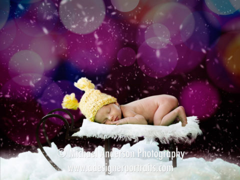 Green screen portrait composite of Miss Jocelyn sleeping on a sleigh.