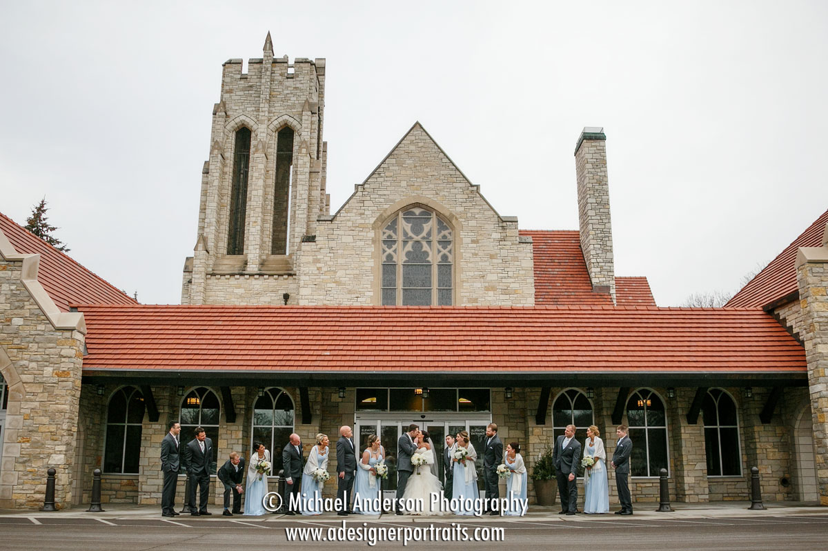 A nice wedding photo of Andrew & Kate's awesome wedding party taken outside at Mount Olivet Lutheran Church.