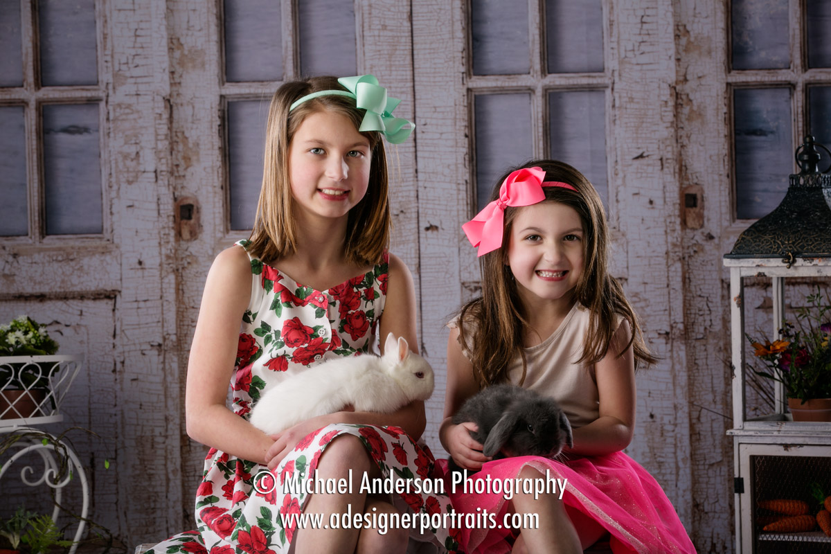 Two cute sisters get their 2017 Easter Portraits with Real Bunnies.