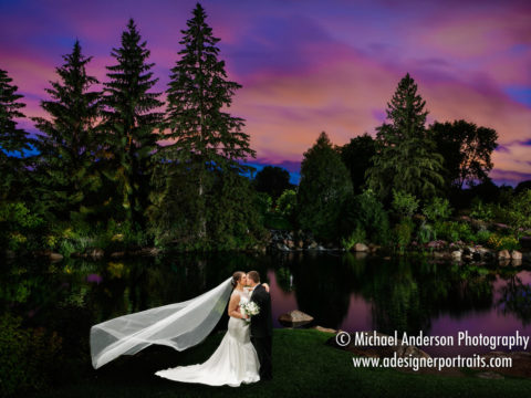 Derek & Zlata by the pond after light painting the scene at their Olympic Hills Golf Club wedding reception.