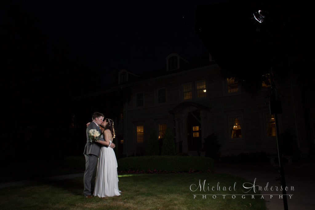 Saint Paul College Club wedding photography of the bride and groom in front of the historic mansion. This is the before image for their light painting wedding photograph.