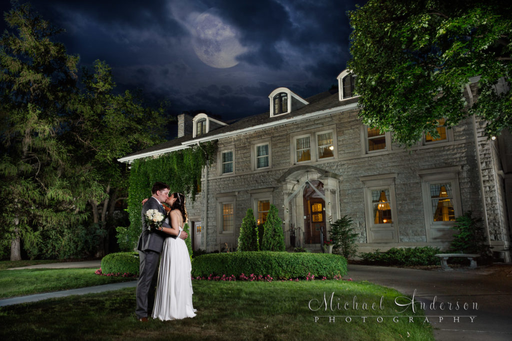 Best Minneapolis Saint Paul MN Wedding Photos in 2017. A stunning light painting with a full moon created at Clint & Gretchen's Saint Paul College Club wedding. Light paining wedding photography done by Michael & Joannie Anderson, owners of Michael Anderson Photography in Mounds View, MN.