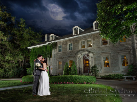 A stunning light painting with a full moon created at Clint & Gretchen's Saint Paul College Club wedding. Light paining wedding photography done by Michael & Joannie Anderson, owners of Michael Anderson Photography in Mounds View, MN.