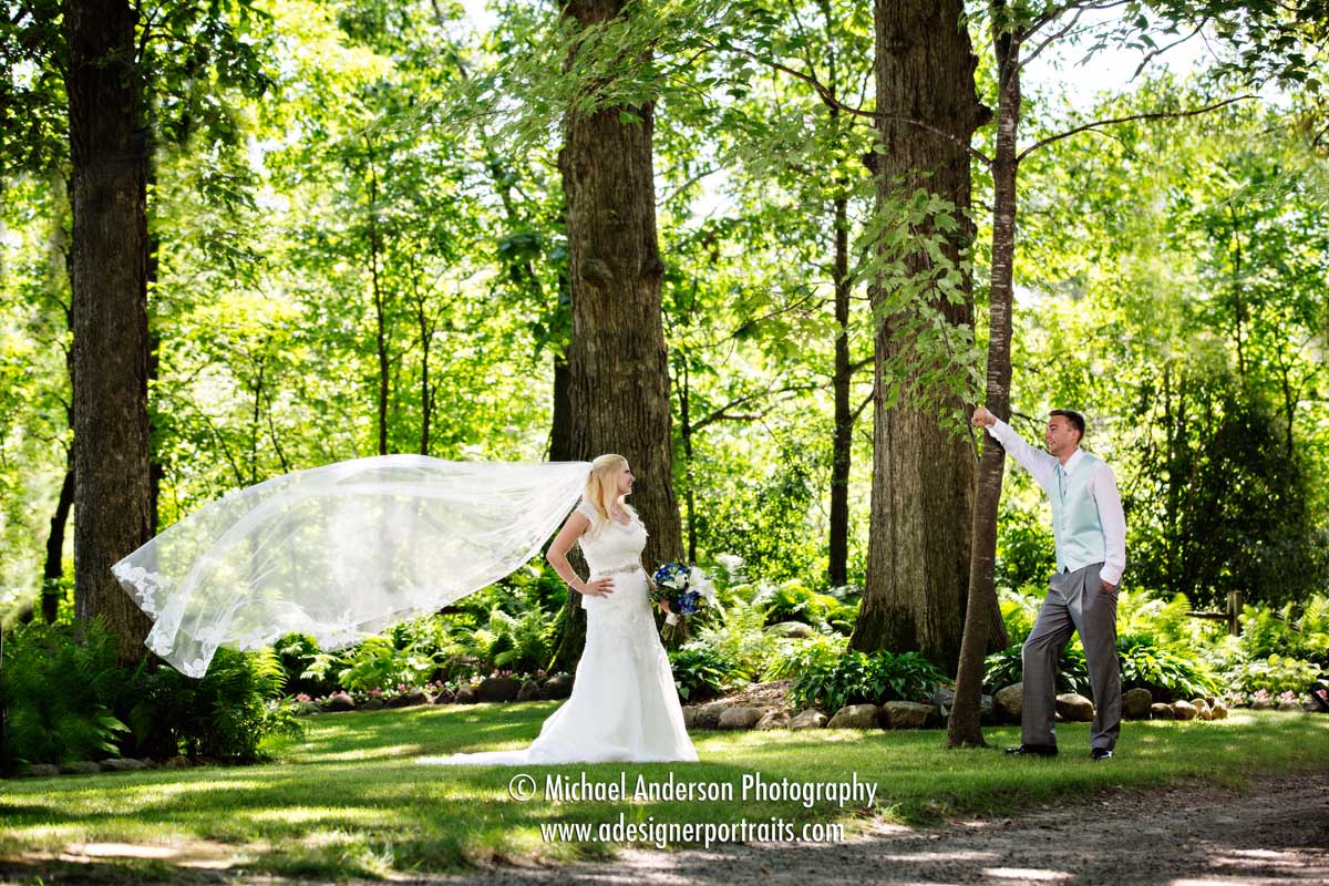 A pretty portrait of Ricky & Rebecca in the woods before their beautiful Panola Valley Gardens wedding in Lindstrom, MN.
