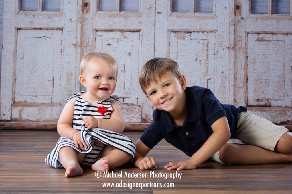 Adorable one year old portraits of Addison and her brother Jordan taken at Anderson's portrait studio in Mounds View, MN.