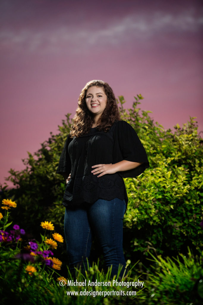 Brianna and a stunning sunset senior portrait. Image was created during her Lake Superior senior portraits at Gooseberry Park Cottages & Motel.