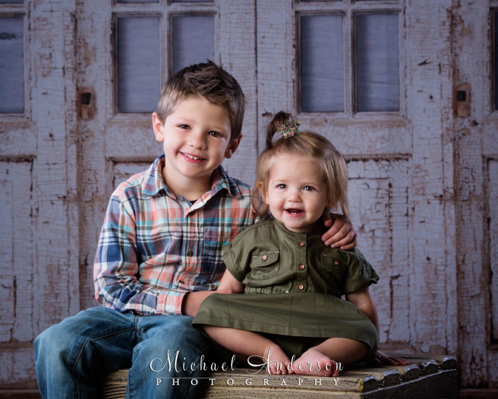 One-year portraits of Lainey, a really cute little girl, and her big brother Logan.