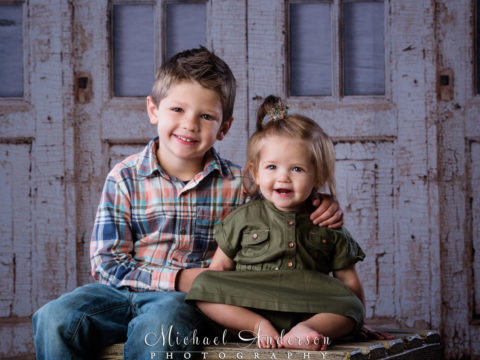 One year portraits of Lainey, a really cute little girl, and her big brother Logan.