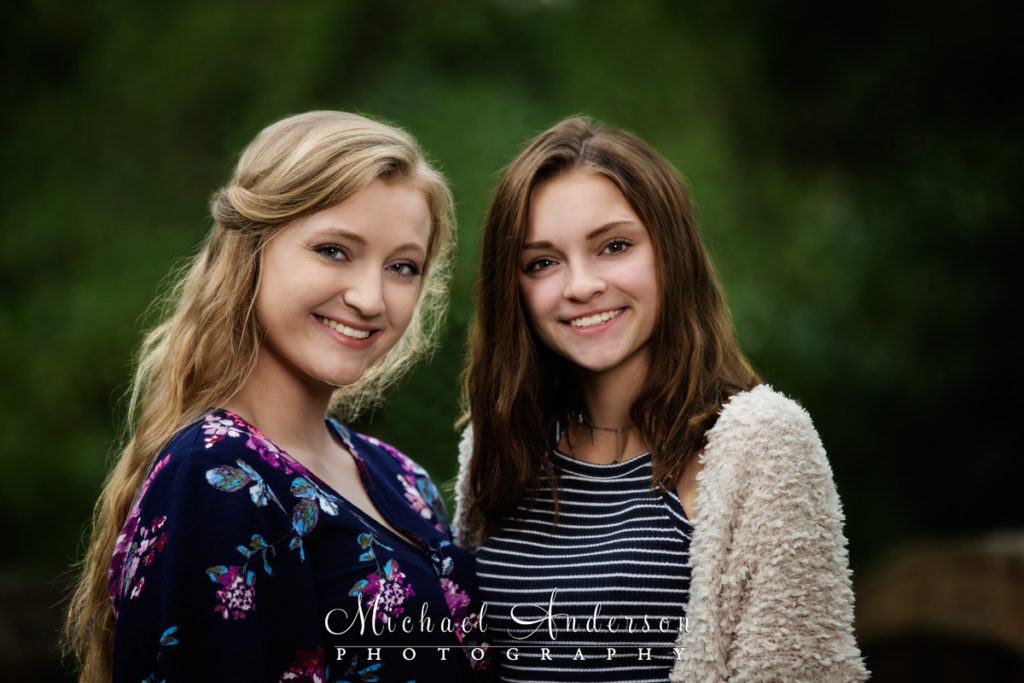 Two pretty sisters pose together at the Minnesota Landscape Arboretum in Chanhassen, MN.