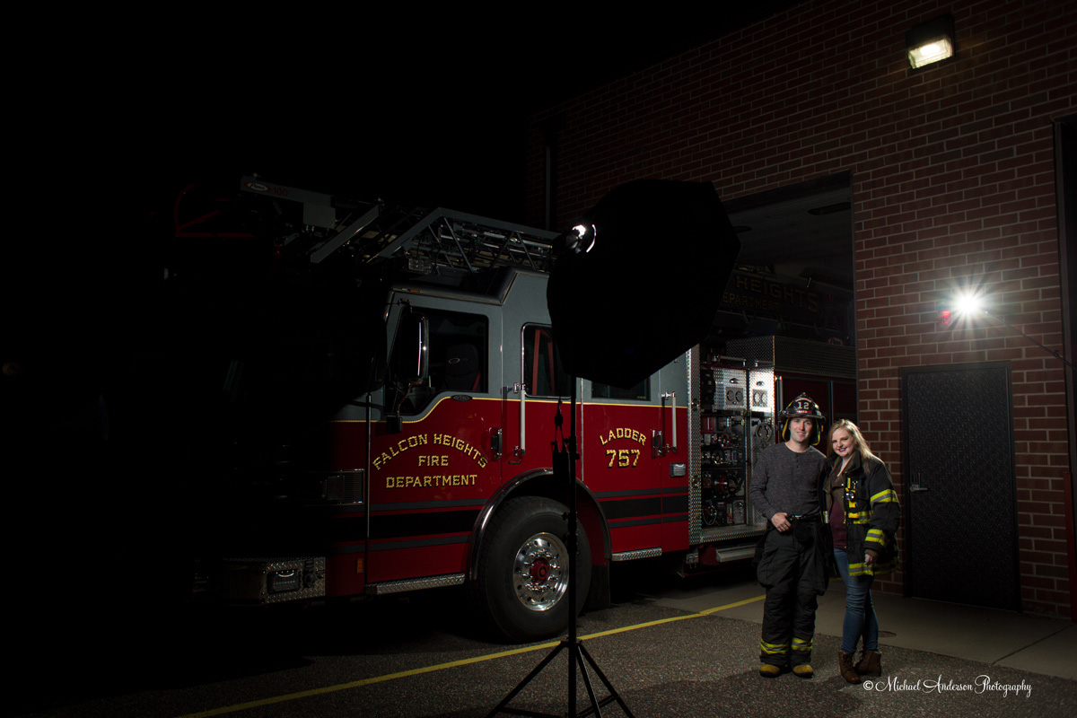 The starting image of an engagement portrait light painting of Ben and Emilee with Ladder 757 at the Falcon Heights Fire Station.