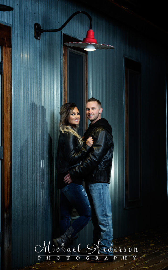 One of Corey and Ashley's fall Stillwater engagement portraits taken at night in downtown Stillwater, MN.
