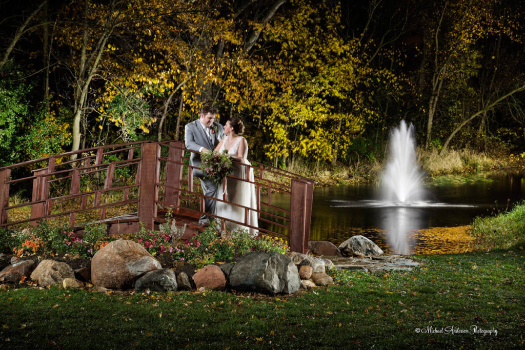 The pretty fall color Minnesota Horse and Hunt Club light painting of Eric and Amanda. The image was created at their wedding reception.