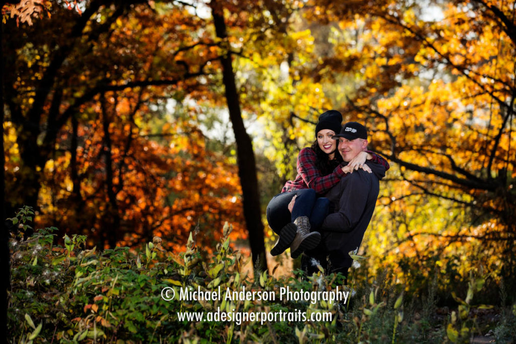 A super cute couple in the stunning fall colors during their Long Lake Regional Park engagement portraits.