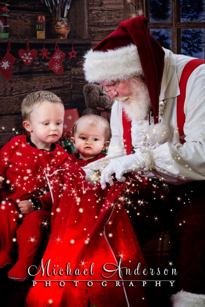 More Storytime with Santa portraits for The Best Santa Experience. Two brothers get a sneak peek into Santa's magic toy bag, pixie dust and all!