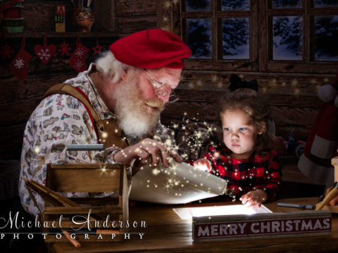 A cute two year old girl discovers that she's on Santa's "Nice List"! All part of The Santa Experience for Cystic Fibrosis.