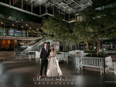 A pretty wedding photography light painting created in the IDS Center Crystal Court. image was created during the couples Windows On Minnesota wedding reception.