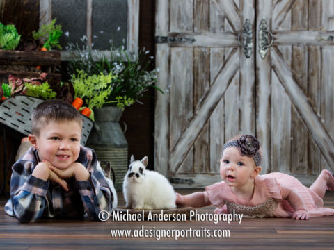 Mounds View MN Photographer Easter Bunny Photographs. A fun Easter Bunny photo of a cute five-year-old boy and his baby sister with two real bunnies.